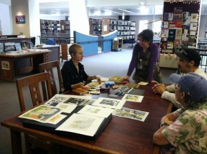 A woodcut artist demonstrates her work at the Rochester Public Library as part of their "Caution! Artist @ Work!" series.