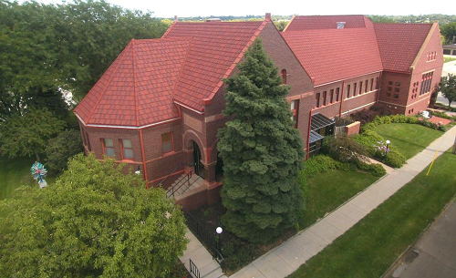 Image Caption/Alt Text: Aerial View of Morton-James Public Library, Morton-James Public Library (CC-BY 4.0)